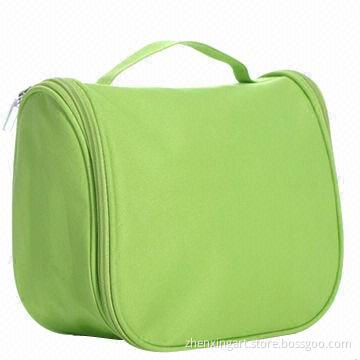Multifunctional toiletry bag with hanger and carry handle